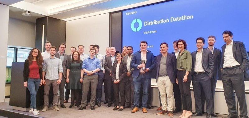 Kortical team accepting award for the Schroders Datathon win