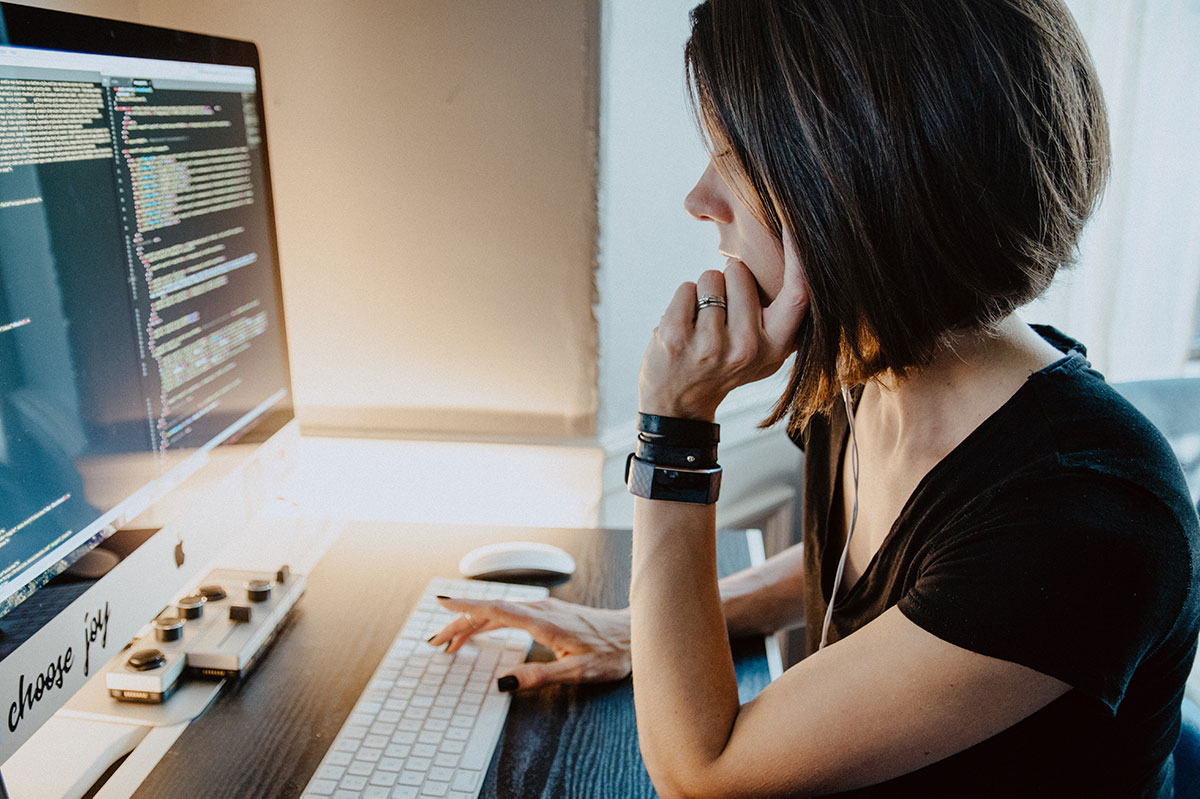 data scientist thinking in front of computer